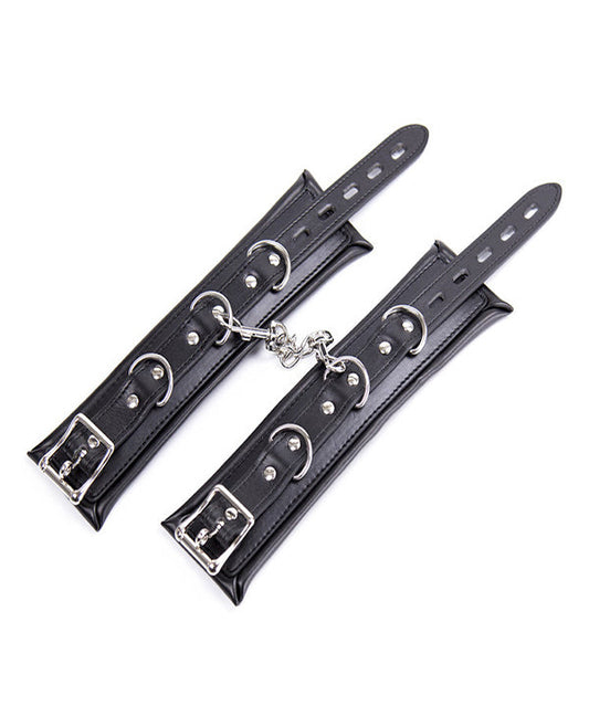 LEATHER WRIST CUFFS.